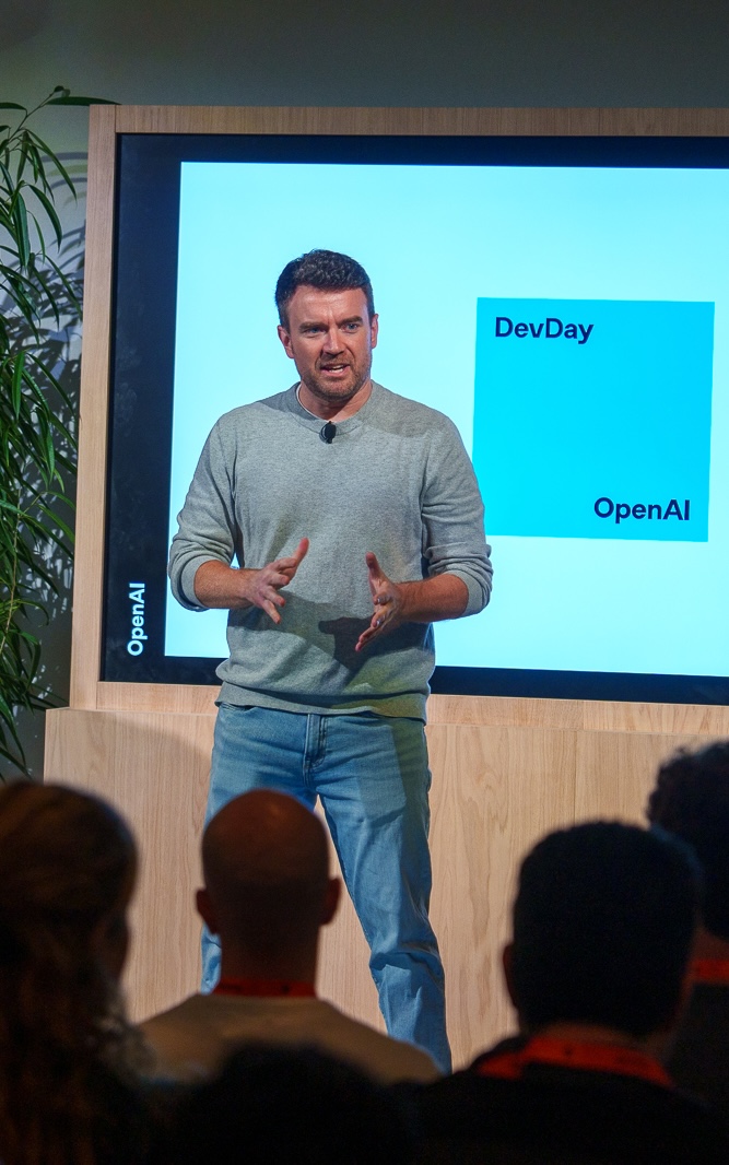 Kevin Whinnery speaking on stage at OpenAI DevDay